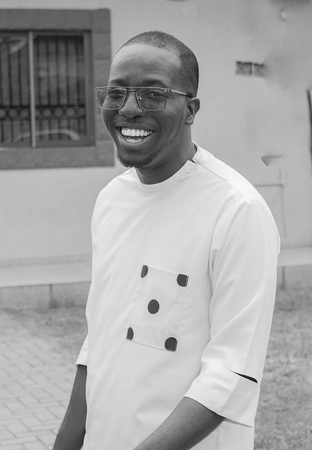 Jide in a black-and-white portrait